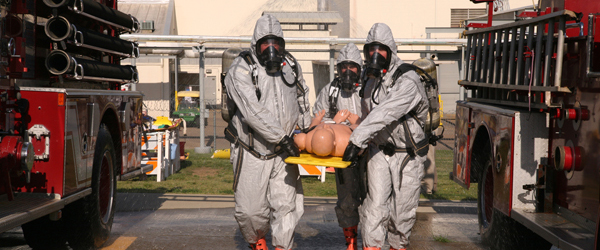 A hazardous materials response team practices life-saving rescue methods