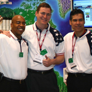 Three male GSA employees, with medals