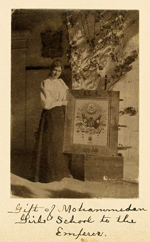 Woman posing with painting