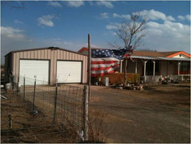 structure saved by Texas Forest Service and American flag