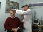 Photo of a person being examined by an otolaryngologist. - Click to enlarge in new window.