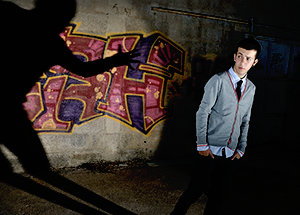 Teen being followed by his shadow