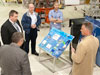 NASA Dryden engineers Curt Hanson (at right), Jim Lee and Chris Miller (center) brief NASA chief technologist Mason Peck on Adaptive Controls for Future Launch Systems flight research being conducted on Dryden's F/A-18 research aircraft as Dryden chief technologist David Voracek looks on.