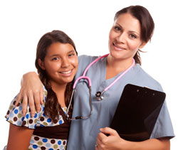Photograph of a nurse with a teen girl.