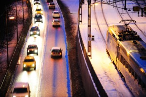 Highway with cars driving on it.