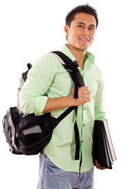 Photograph of a teen boy carrying a duffel bag and school books.
