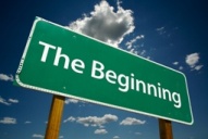 "The Beginning" sign post