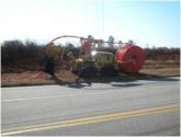 IMG: A Columbia County truck lays down fiber optic lines