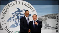 Obama and Berlusconi in front of G8 logo (AP Images)