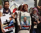 Family members and other protesters demand the return of Alhurra journalists captured in Syria.
