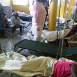 Haitians receiving treatment for cholera.