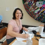 Araceli working in the dining area of the Haiti U.S. Embassy