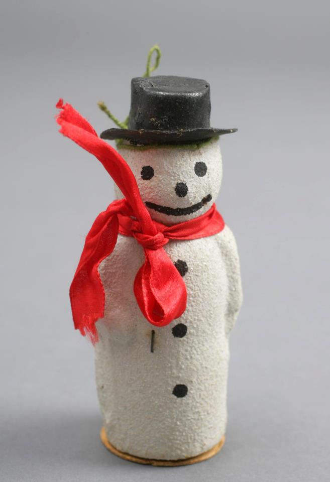 Image description:
From the National Archives:

Truman’s Snowman
Christmas ornament that hung on Margaret Truman’s first Christmas tree in 1924.  According to Margaret, this ornament was used year after year – along the way, this snowman lost his pipe.
