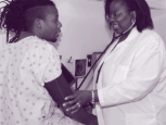 photo of African American doctor and patient
