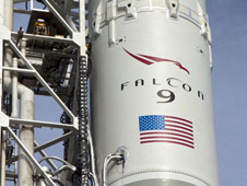 SpaceX Falcon logo on rocket.