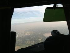 A photo through the NASA P-3B's cock-pit window as they flew over Fresno, Calif. on Jan. 22, showing a very hazy atmosphere over the area.