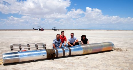 The Hi C recovering team poses for a photo with the payload.