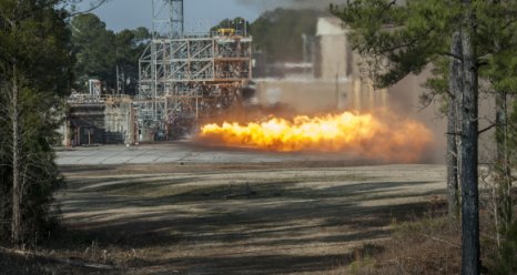 A gas generator from an F1 engine is test fired at the Marshall Space Flight Center