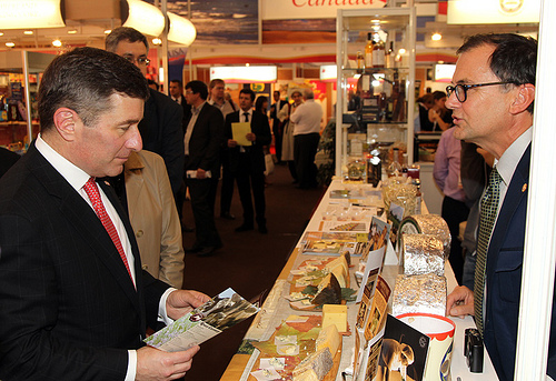 Rogue Creamery cheesemaker and co-owner, David Gremmels (right), speaks with a customer during the international trade show, SIAL Paris, last year. The Oregon company credits the Foreign Agricultural Service’s (FAS) Market Access Program (MAP) and industry partners for helping the company expand international sales of its award-winning cheeses. (Courtesy Photo)