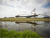 Space shuttle Atlantis is towed to the Orbiter Processing Facility (OPF).