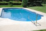 You can reduce the cost of heating your swimming pool by installing a high-efficiency or solar heater, using a pool cover, managing the water temperature, and using a smaller pump less often. | Photo courtesy of ©iStockphoto/herreid