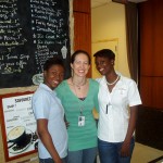 Molly with Alide Desir and Lovely Toussaint, baristas at the embassy coffee bar.