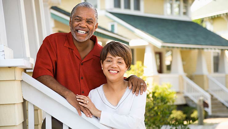 African American couple standing outside home, Create the Good