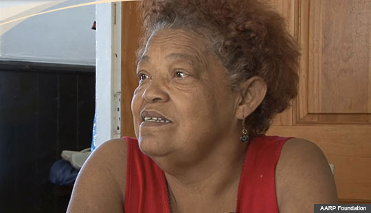 Portrait of woman looking outward, AARP Foundation's Hungry in the West End documentary series