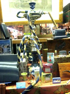 Waterpipe and other tobacco products displayed in a store window