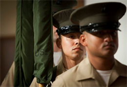 The Marine Corps’ Force Structure Review brings change to various aspects of the Corps’ Reserve Force, ranging from fine-tuning of occupational specialties to tweaking unit sizes and locations, or even shifting entire command structures. In some cases units will be re-designated as a different type of unit. The widespread adjustments can create opportunities for the Reserve Marines involved or hasten their departure from the Corps. For the Reserve Force, the effects of FSRG may seem even more accentuated due to the location of Reserve units spread across 47 of the United States, close to Marines’ hometowns; having a different type of significant impact on Reserve Marines than the periodic relocation their active duty counterparts experience every few years. In this photo, Marines carry the retired Marine Corps Mobilization Command colors during a deactivation ceremony.  As a result of Force Structure changes, the Marine Individual Reserve Support Organization was stood up in its place.