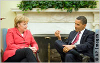 Merkel and Obama seated next to each other (AP Images)