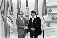 Photograph of Richard M. Nixon and Elvis Presley at the White House: 12/21/1970