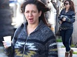 Is that a baby bump? 'Pregnant' Maya Rudolph goes for comfort over style in leggings and knitted sweater