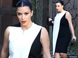 'I dress for my man': Kim Kardashian debuts a new chic maternity-style monochrome shift she reveals she likes to please Kanye with her outfits