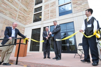 Ribbon cutting to dedicate the new JILA X-Wing addition at the University of Colorado Boulder. Left to right: Tom O'Brian, chief of the NIST Quantum Physics Division; Philip DiStefano, Chancellor of the University of Colorado Boulder; NIST Director Patrick Gallagher; and Eric Cornell, JILA Department Chair and Nobel Laureate. ((Photo: Casey A. Cass/University of Colorado))