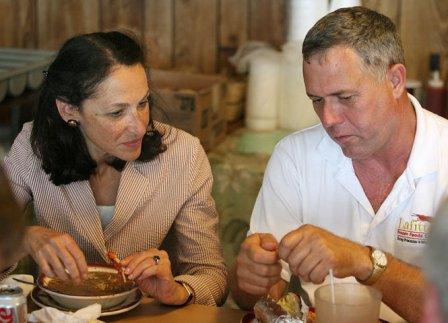 Dr. Margaret A. Hamburg, Commissioner of Food and Drug, eats some seafood gumbo in New Orleans.