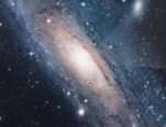 Photo copyright R. Gendler: Image that reveals that the Andromeda Galaxy's (M31's) core is composed of a ring of old, red stars and a newly discovered disk of young, blue stars.