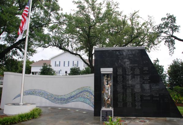 Biloxi, Miss., August 29, 2010 -- The Hurricane Katrina Memorial on the Town Green at the Biloxi 5th annual Katrina memorial observance. The height of the black granite is the same height as the water from the storm surge. Photo by Tim Burkitt/FEMA photo. 