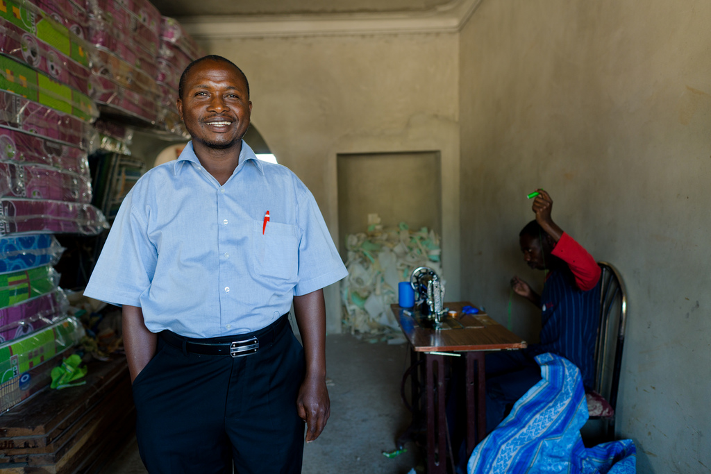 DCA borrower, John Warugaba's mattress and cake making business in Mbarara, Uganda