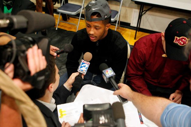 Hightower High School's Maurice Smith talks to the media as he made his commitment to play football at Alabama during a signing day ceremony at the Buddy Hopson Field House Tuesday, Feb. 5, 2013, in Missouri City. Photo: Johnny Hanson, Houston Chronicle / © 2013  Houston Chronicle