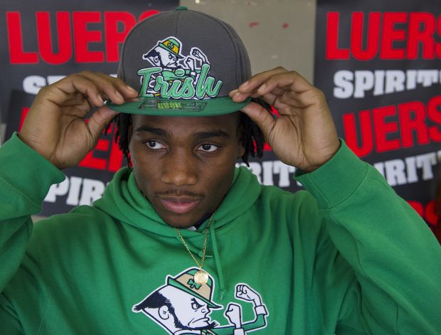 Linebacker Jaylon Smith wears a Notre Dame hat and sweatshirt after signing a letter of intent with Notre Dame, at Bishop Luers High School on Wednesday, Feb. 6, 2013, in Fort Wayne, Ind. (AP Photo/The Journal-Gazette, Swikar Patel) NEWS-SENTINEL OUT  MAGS OUT  NO SALES Photo: Swikar Patel, Associated Press / The Journal-Gazette