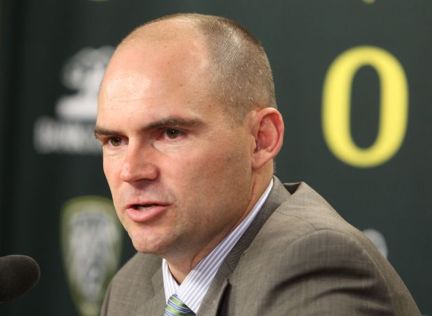 Oregon football coach Mark Helfrich talks about the NCAA college football team's recruits on signing day, in Eugene, Ore., on Wednesday, Feb. 6, 2013. (AP Photo/The Register-Guard, Chris Pietsch) Photo: Chris Pietsch, Associated Press / The Register-Guard