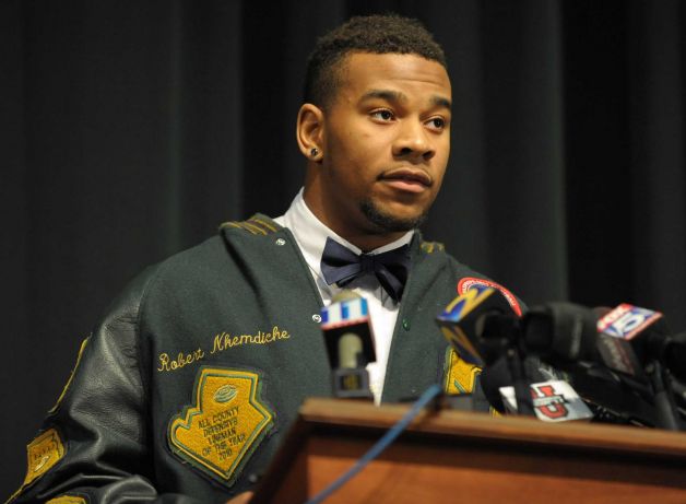 Grayson High School football player Robert Nkemdiche, the nation's top recruit, announces his intent to play college football for Ole Miss, at a Grayson, Ga., signing ceremony Wednesday Feb. 6, 2013. (AP Photo/David Tulis) Photo: Dave Tulis, Associated Press / FR170493 AP