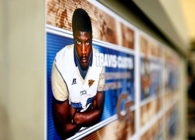 An image of new recruit Travis Custis is displayed on a board after Georgia Tech head football coach Paul Johnson spoke at a signing day news conference, Wednesday, Feb. 6, 2013, in Atlanta. Georgia Tech didn't have room to sign a big class, so Johnson says he focused on filling needs with his class of 14 signees. The class is highlighted by running back Travis Custis of Lovejoy High School and offensive linemen Shamire DeVine of Atlanta's Tri-Cities High School and Chris Griffin of Panacea, Fla. The class is not highly rated, but Johnson says many of his all-Atlantic Coast Conference players were not highly rated by recruiting experts. (AP Photo/David Goldman) Photo: David Goldman, Associated Press / AP