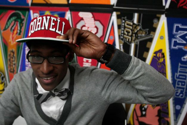 Robert Hatter of Westside High school shows off his Cornell University hat after signing his letter of intent to play basketball at Cornell University, Wednesday, February 6, 2013. Student athletes from Houston schools signed there letters of intent during the National Signing Day ceremony for Houston ISD at Delmar Field House. Photo: Billy Smith II, Chronicle