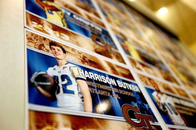 An image of new recruit Harrison Butker is displayed on a board after Georgia Tech head football coach Paul Johnson spoke at a signing day news conference, Wednesday, Feb. 6, 2013, in Atlanta. Georgia Tech didn't have room to sign a big class, so Johnson says he focused on filling needs with his class of 14 signees. The class is highlighted by running back Travis Custis of Lovejoy High School and offensive linemen Shamire DeVine of Atlanta's Tri-Cities High School and Chris Griffin of Panacea, Fla. The class is not highly rated, but Johnson says many of his all-Atlantic Coast Conference players were not highly rated by recruiting experts. (AP Photo/David Goldman) Photo: David Goldman, Associated Press / AP