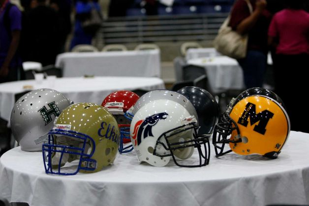 Fort Bend ISD High School football helmets sit on a table  during a signing day ceremony at the Buddy Hopson Field House Tuesday, Feb. 5, 2013, in Missouri City. Photo: Johnny Hanson, Houston Chronicle / © 2013  Houston Chronicle