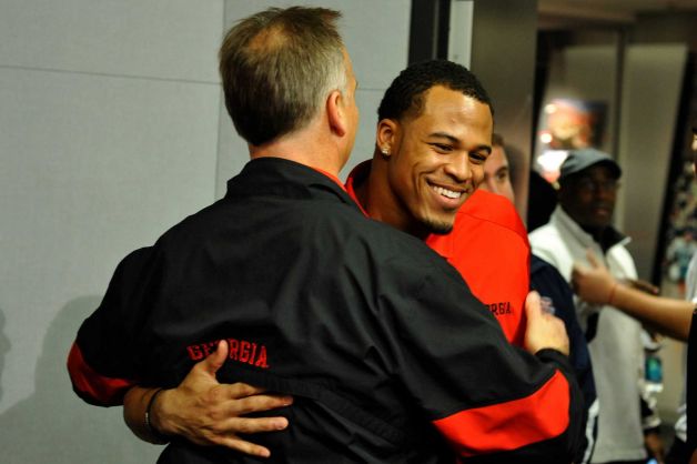 Georgia safety Tray Matthews hugs head coach Mark Richt during a national signing day news conference in Athens, Ga., Wednesday, Feb. 6, 2013. (AP Photo/The Athens Banner-Herald, AJ Reynolds)   MAGS OUT; MANDATORY CREDIT Photo: AJ Reynolds, Associated Press / OnlineAthens & The Athens Banner
