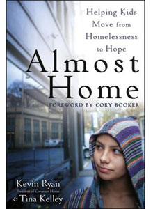 Book cover of Almost Home, showing a young person wearing a hoodie.