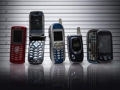 Line-up of old cell phones